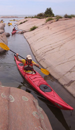 Sneaking 		
            through Phillip Edward Island, kayak, Killarney Ontario